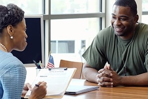 Employer interviewing job applicant