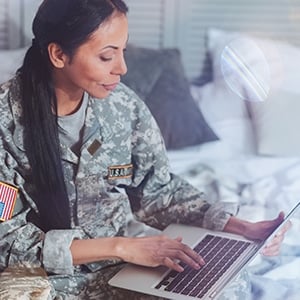 U.S. Army Soldier on Macbook