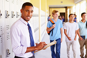 Teacher in Front of Locker